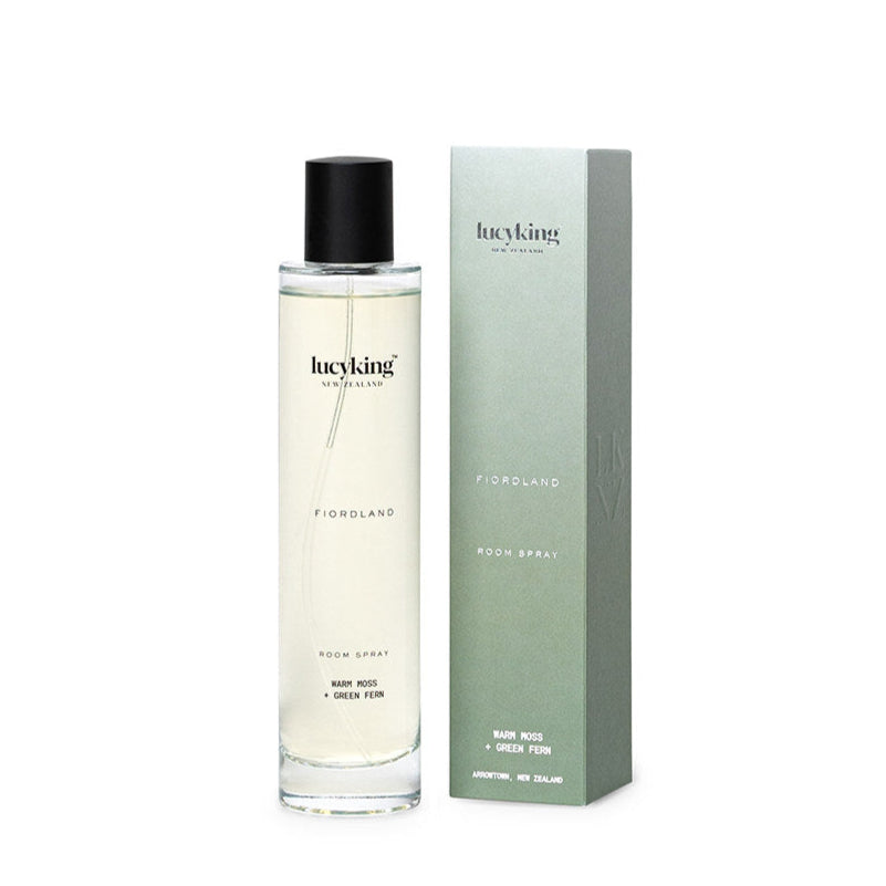 Clear LucyKing FIORDLAND room and linen spray bottle with green packaging on a white background